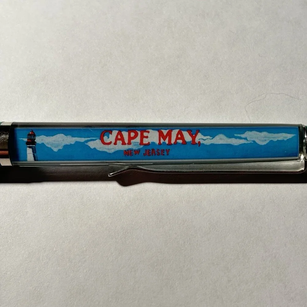 Cape May New Jersey Floaty Pen People on Tandem Bike Move by Victorian Houses